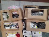 several boxes of assorted items are stacked on top of each other
