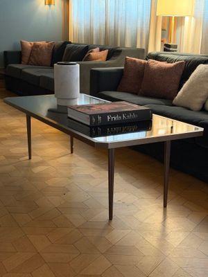 a living room with a couch and a coffee table
