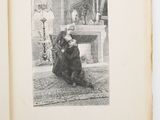 an open book with a black and white photo of a woman sitting on the floor