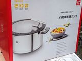 a box that has a cookware set inside of it
