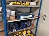 many boxes of tools on the shelves in the room