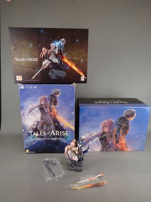 three boxes of video games on a table