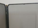 two open suitcases sitting side by side on a white surface