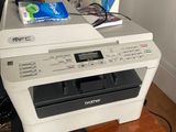 a printer that is sitting on top of a desk