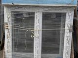 a large window that is sitting on a pallet
