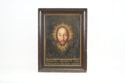a painting of a man with a beard on a wall