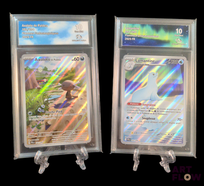 two pokemon cards on display on a black background
