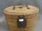 an image of a small wicker box with a metal latch