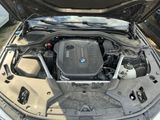 a bmw engine in the trunk of a car