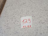 a box with a sign on it sitting on the floor
