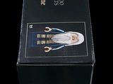 an image of a black box with a picture of an old man on it
