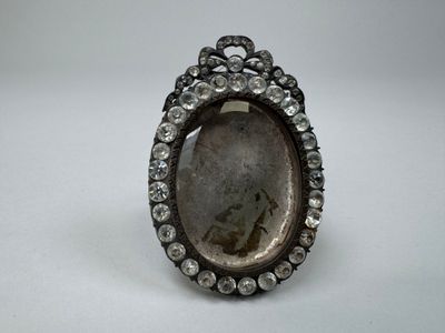 a close up of a ring with a stone in it
