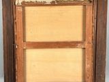 an old picture frame with a picture of a cat in it