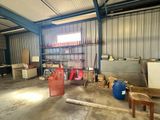 an image of a garage with a lot of furniture