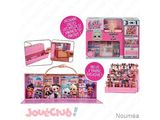 a picture of a pink box with a bunch of dolls inside of it