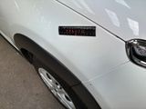 a close up of a car with a sticker on it