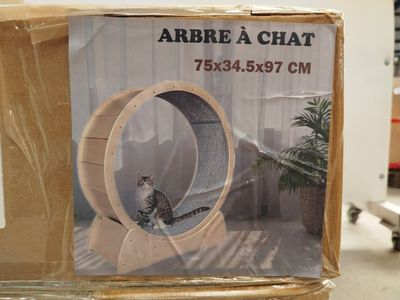 a cardboard box with a picture of a cat inside of it