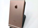 an image of a close up of a cell phone on a stand