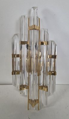 brass and clear glass chandelier with gold accents