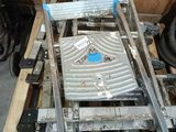 a metal ladder that is sitting on top of a pallet