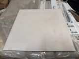 a pile of boxes with a sheet of paper on top of it