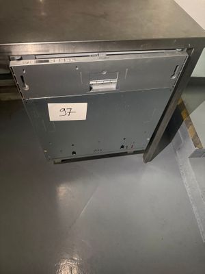 a metal cabinet with a label on it in a room