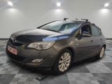 a picture of a grey opel car in a garage