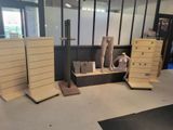 several pieces of furniture are stacked on top of each other in a room