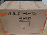 a cardboard box that is sitting on the floor