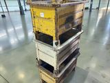 a picture of a stack of pallets in a warehouse