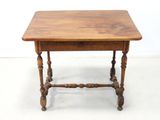 a small wooden table with a drawer underneath it