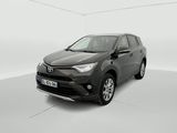 a grey toyota rav parked in a white room