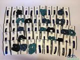 a lot of hair clips that are on top of each other