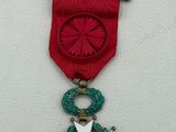 a close up of a medal with a star on it