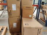 several boxes are stacked on pallets in a large warehouse