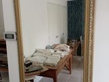 a large mirror hanging on the wall in a living room