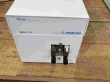 an image of a white box sitting on top of a wooden table