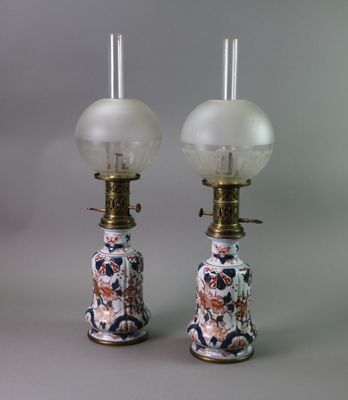 pair of antique chinese porcelain lamps with glass lampshads