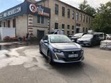 a car parked in front of a building in a parking lot
