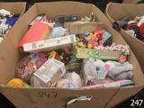 a cardboard box full of toys and toys for sale