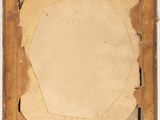 an old photo of a piece of paper with a hole in it