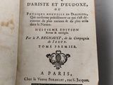 an open book with a black and white title on it