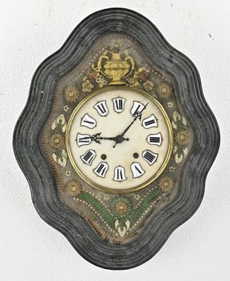 a clock with roman numerals on the face of it