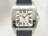 une image d'une montre en argent avec des chiffres romains sur le cadran