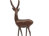 a close up of a statue of a deer on a white background