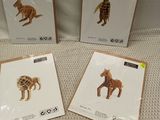 three cards with a picture of a zebra and a giraffe on them