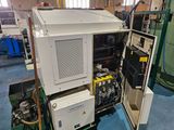 a machine that is sitting inside of a building