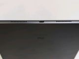 a close up of the back of a tablet computer on a table