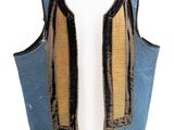 an image of a blue and yellow vest on a mannequin head