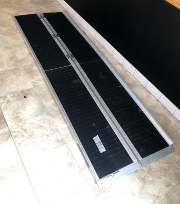 a picture of a metal ramp on a tiled floor